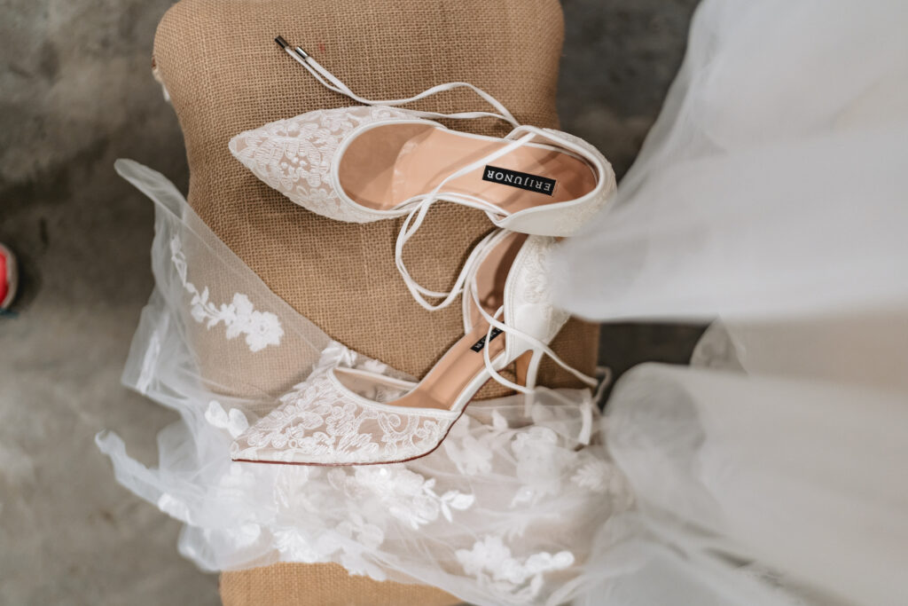 wedding shoes sitting on a bench