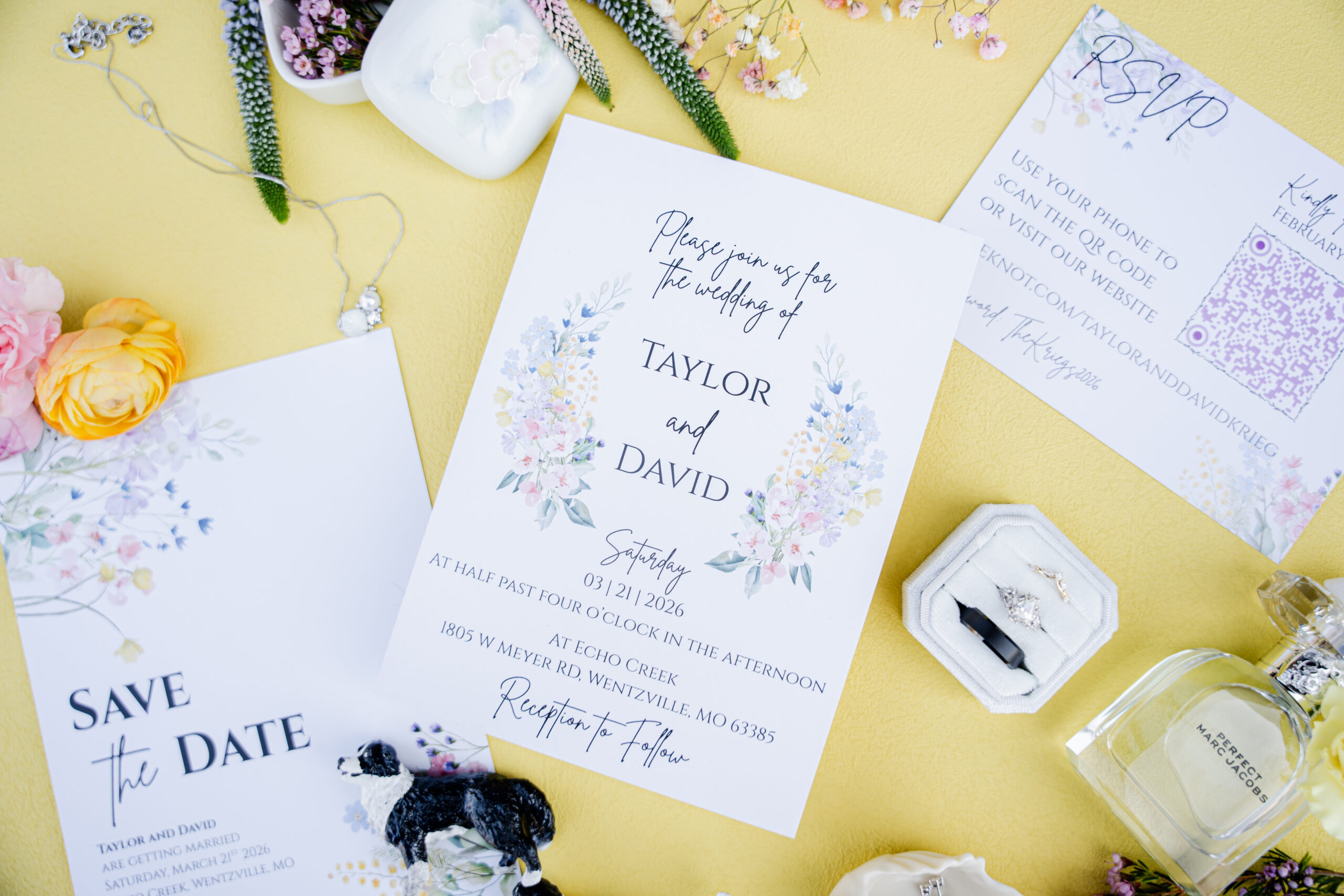 wildflower wedding invitation on yellow flat lay mat